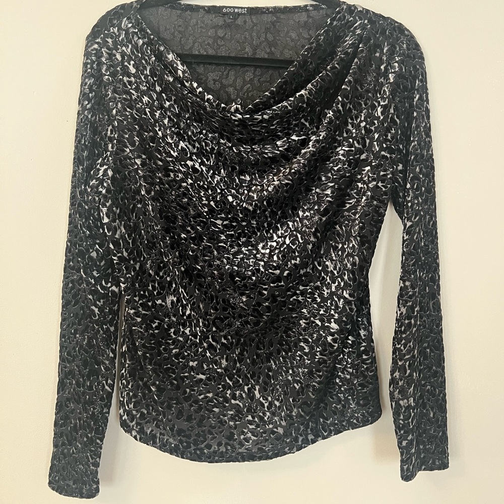 600 West black and white leopard blouse